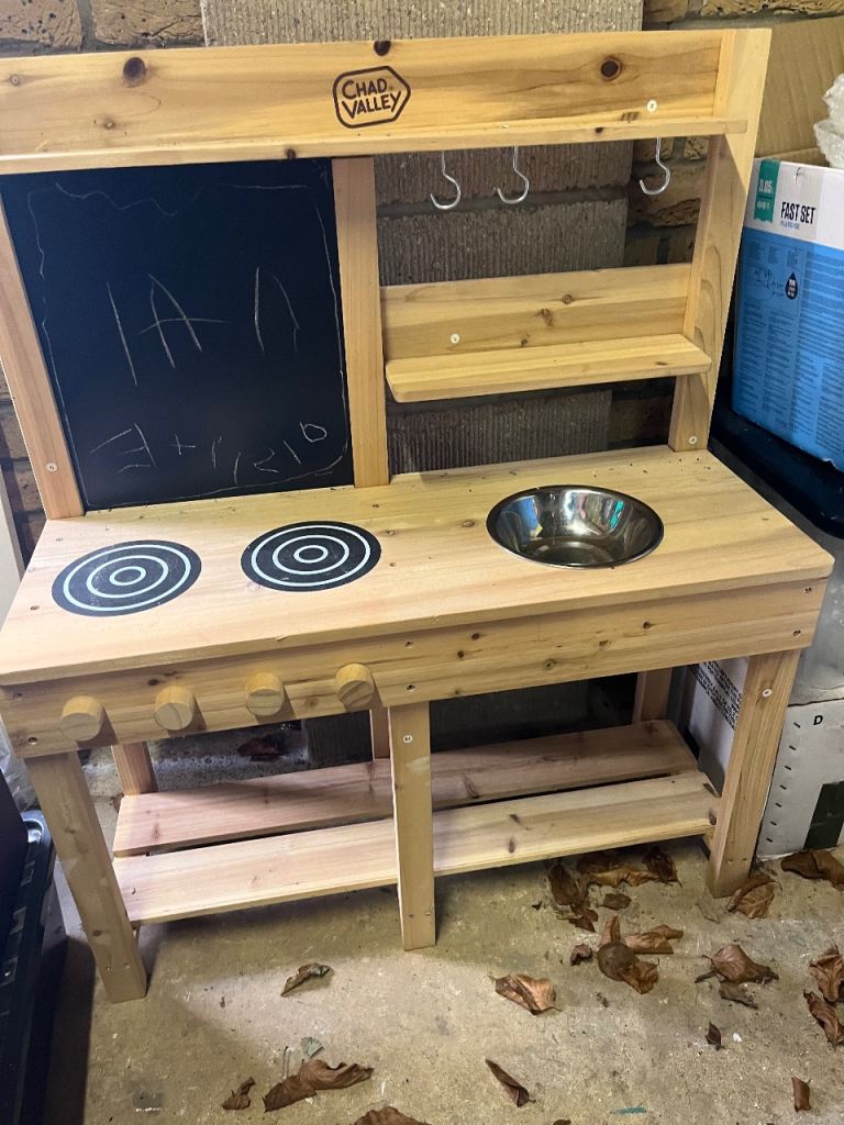 Kids wooden mud kitchen