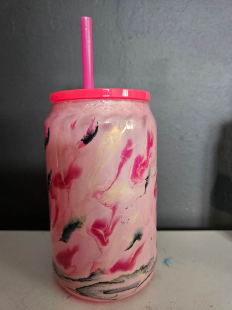 Handmade epoxy resin coated cups with staws 