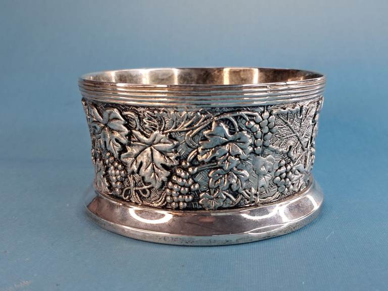 Vintage Silver Plate, Wine Bottle Holder Grape & Vine ornaments around.