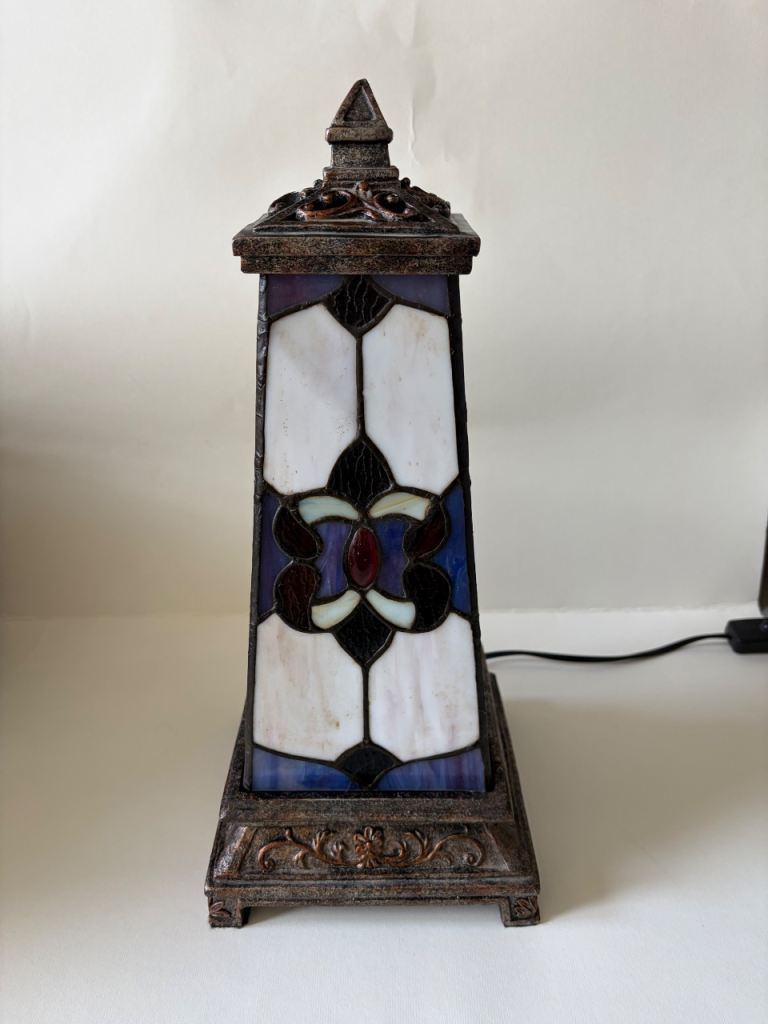 Art deco Tiffany table light lamp featuring a geometric stained-glass shade 