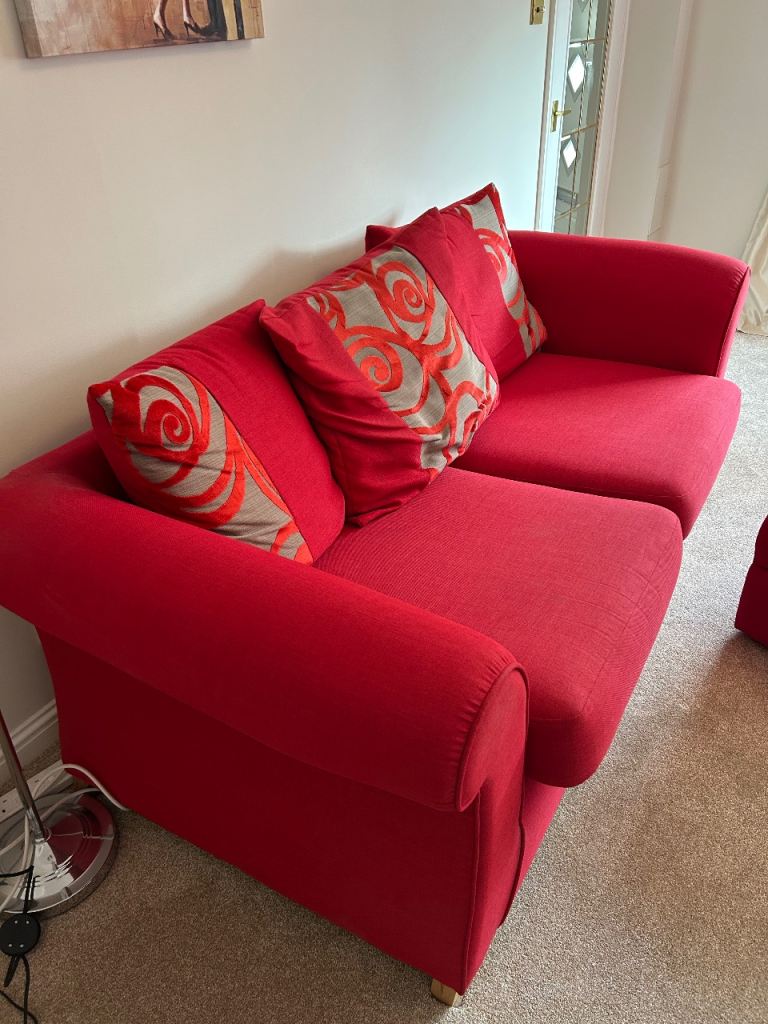 2 DFS 3 seater red sofa for sale plus foot stool