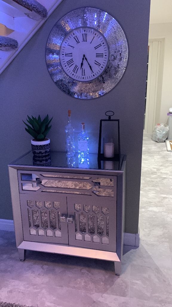 Silver sideboard and matching clock 