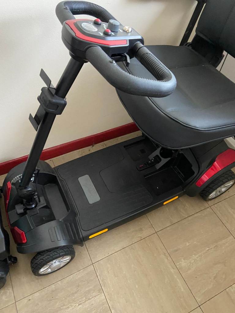 Mobility Scooter – Red and Black, Good Condition
