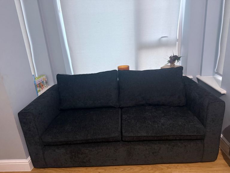 Black Two-Seater Sofa – Good Condition