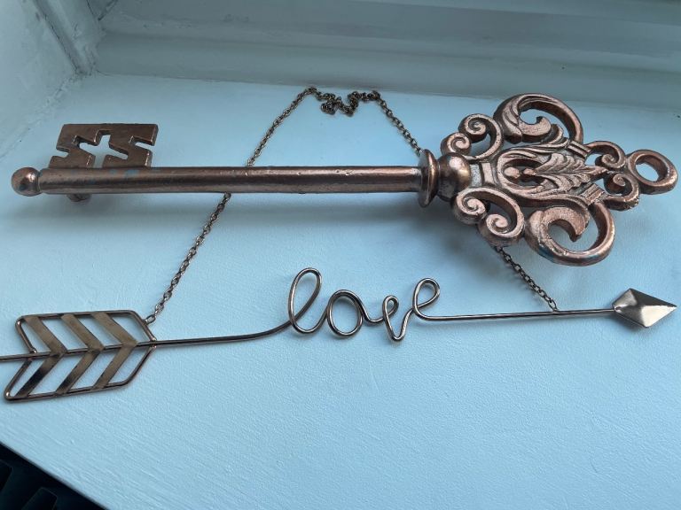 Set of two rose gold wall ornaments