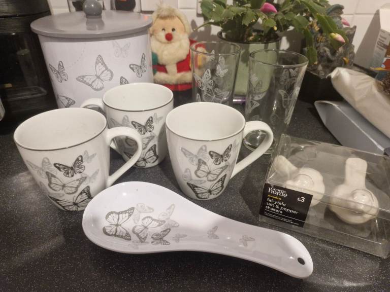 Bundle of kitchen items never used. Pans, mugs, canister, glasses, butterfly print