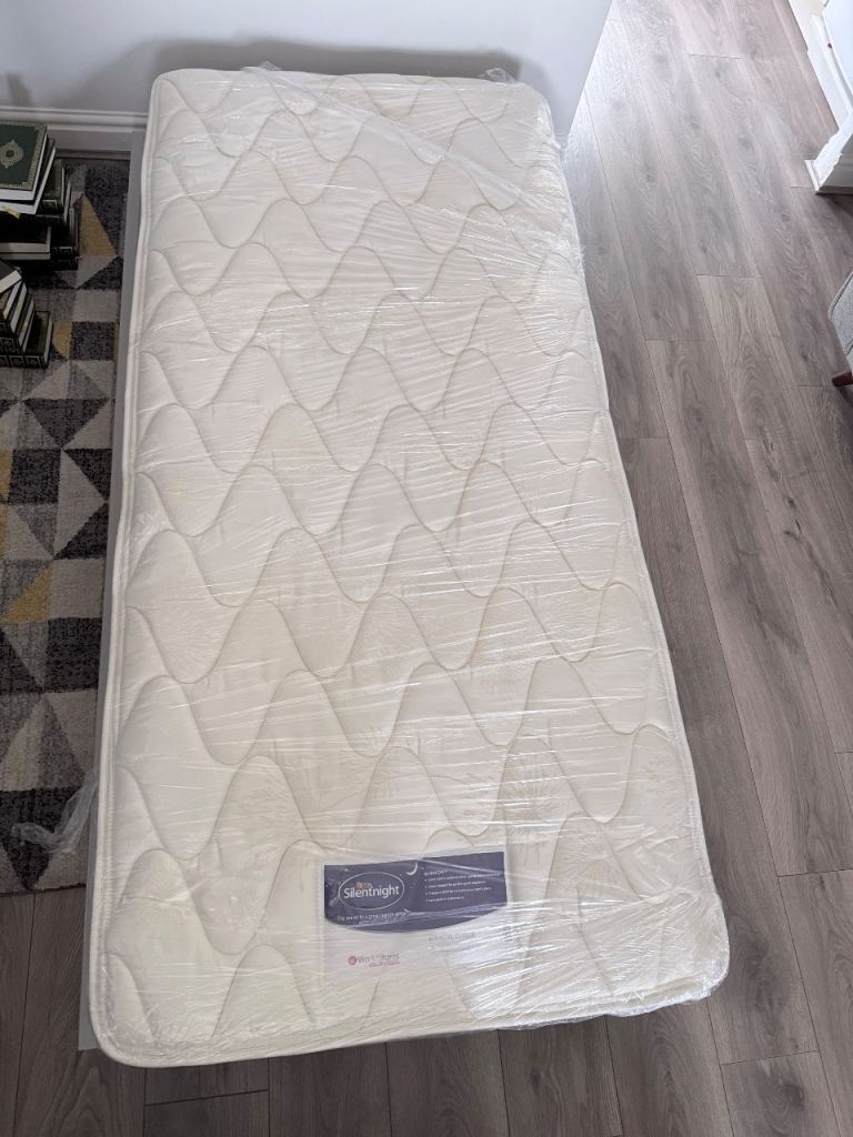 Single trundle bed with silent night mattress 
