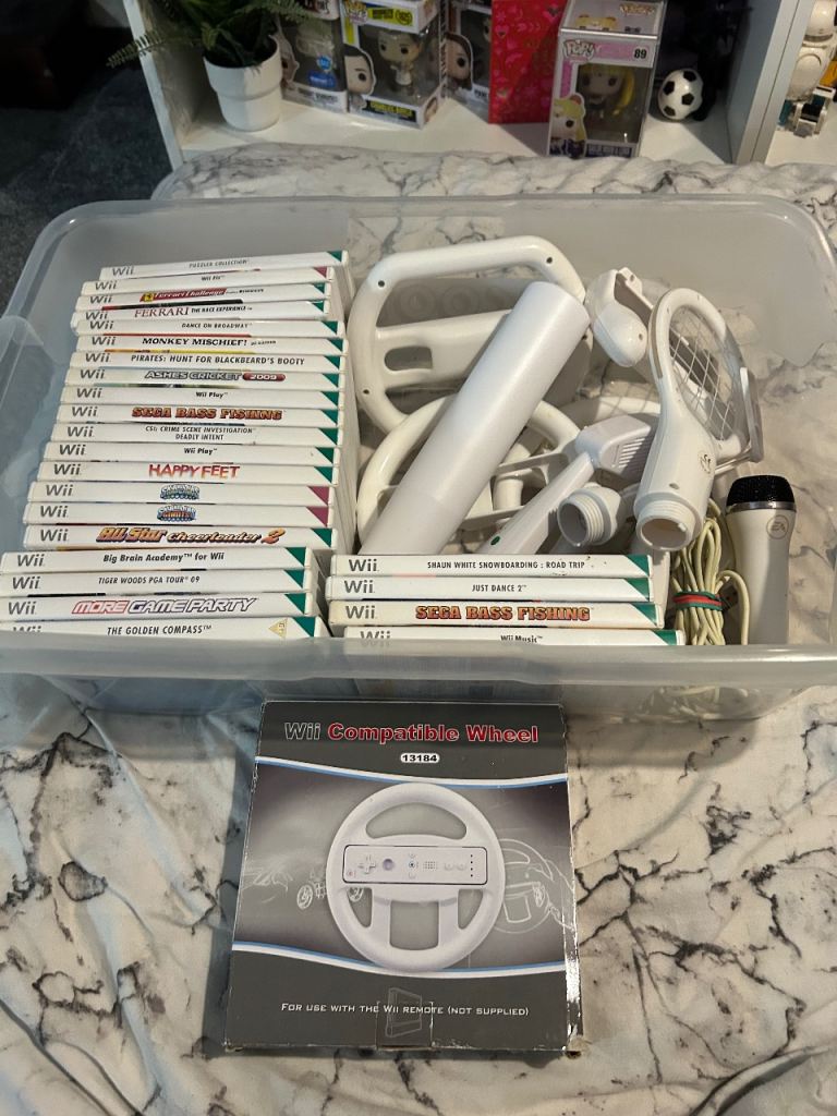 24 Nintendo Wii games and accessories 