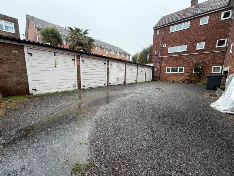 Lovely secure garage with lots of locks and internal LED lights in a CCTV monitored private car park
