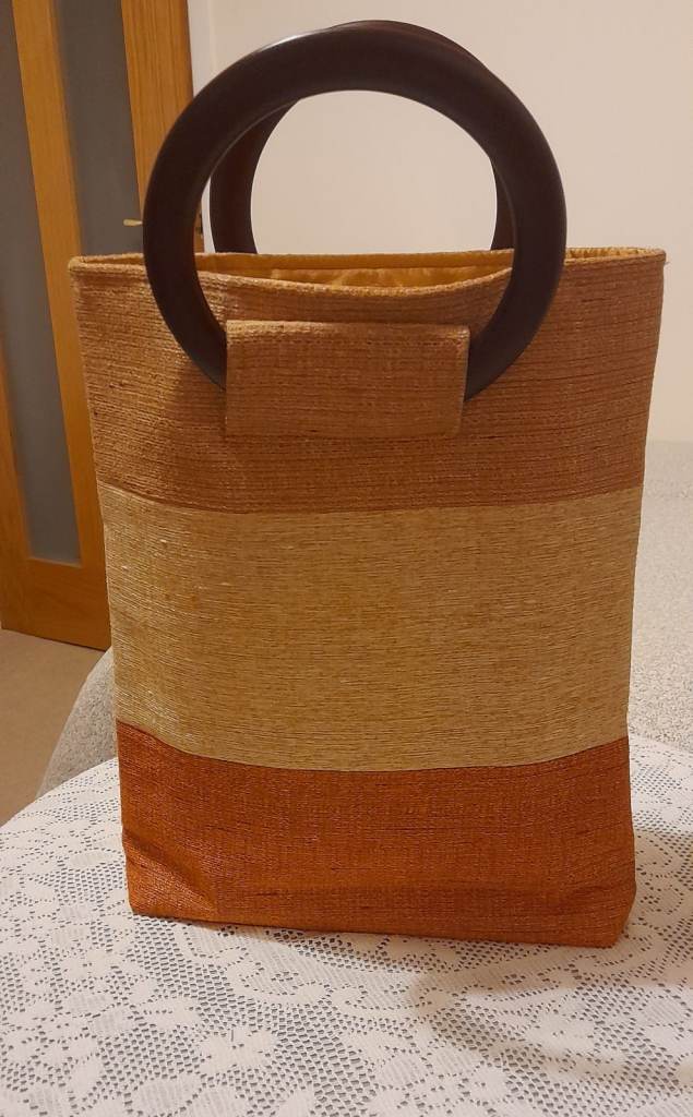 Shiny Bag with lovely gold lining.