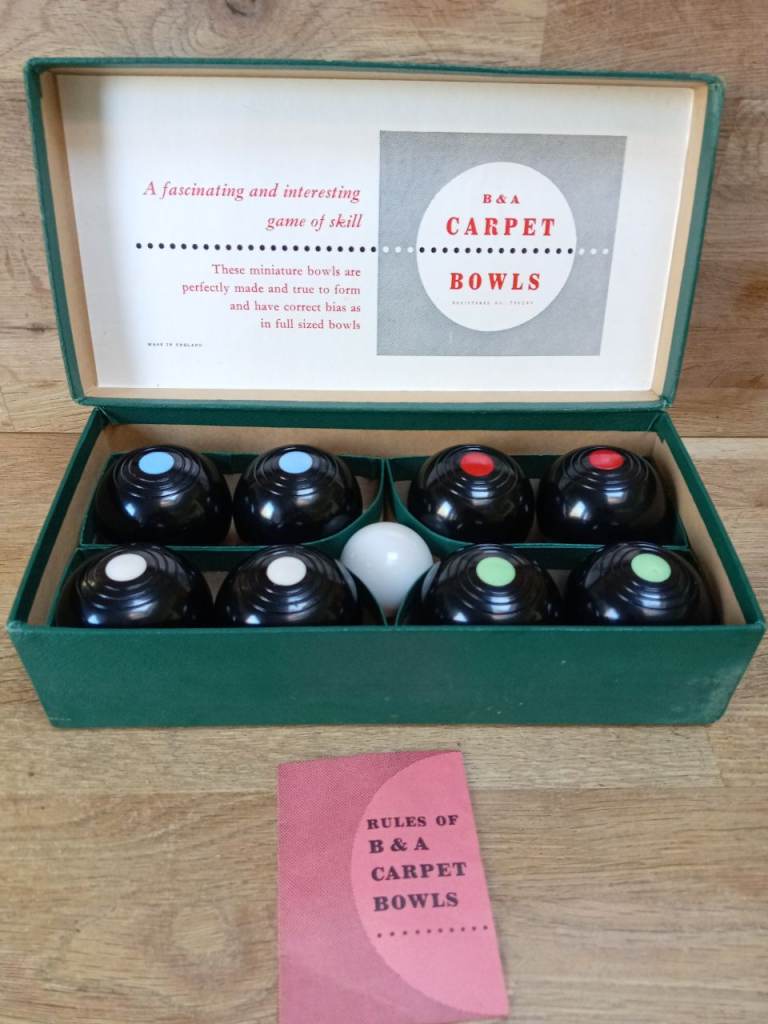 Miniature carpet or lawn bowls