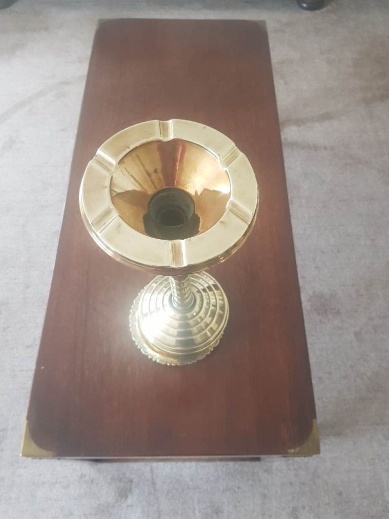 Brass ashtray with weighted base