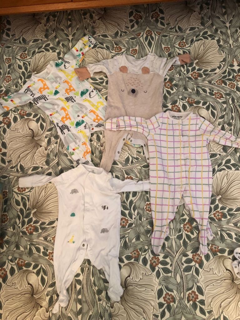 Bundle of 7 baby sleepsuits