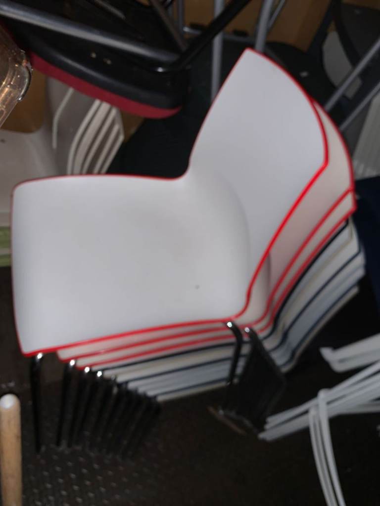 Designer stacking cafe chairs solid plastic and chrome legs 
