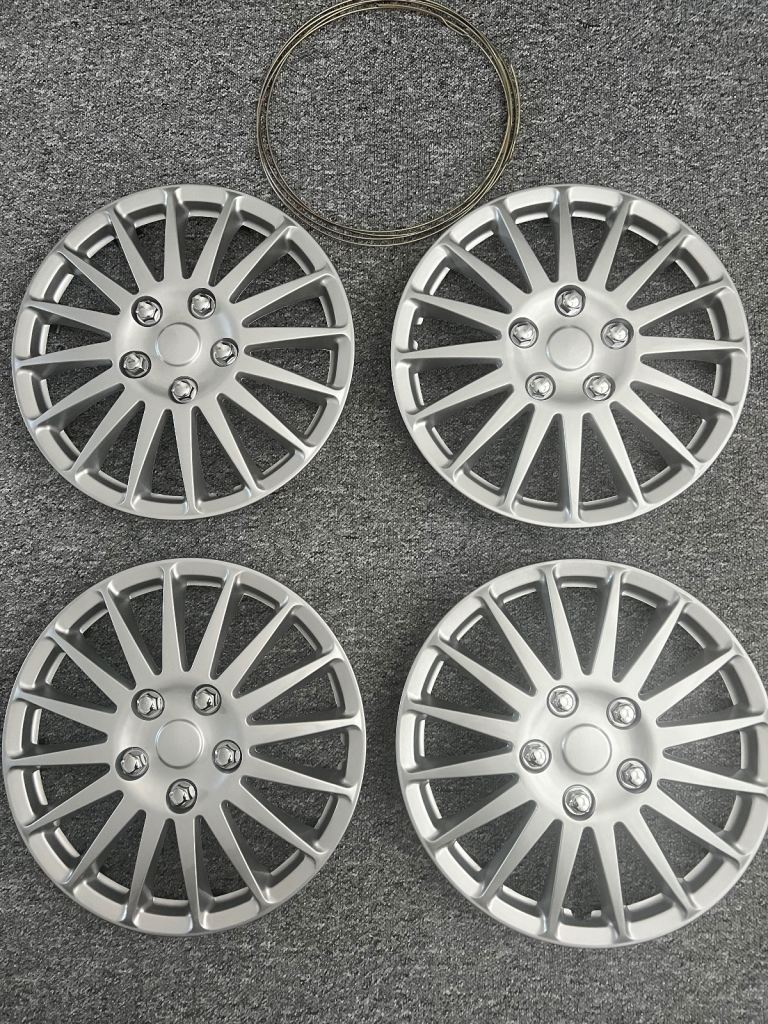 image for Universal Wheel trims 14 inch set of 4 new in box 
