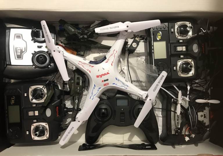 Syma X5C Drone with Remote Controls and Other Gadgets – Good Condition