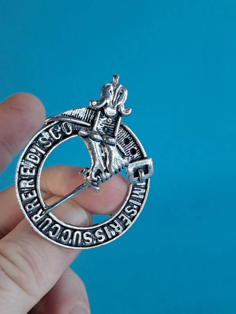 Brand new Cap Badge,brooch MacMillan. 