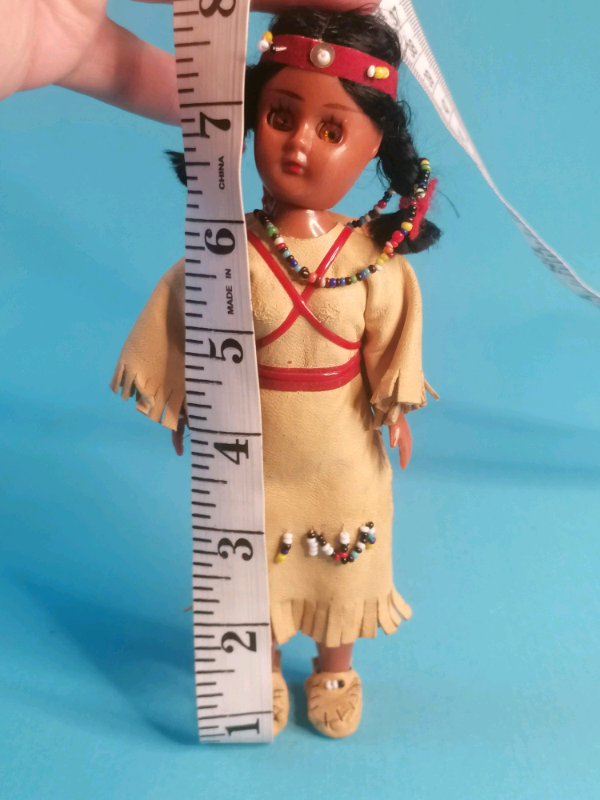 8-inch A vintage hard plastic Canadian doll in Native Indian costume.