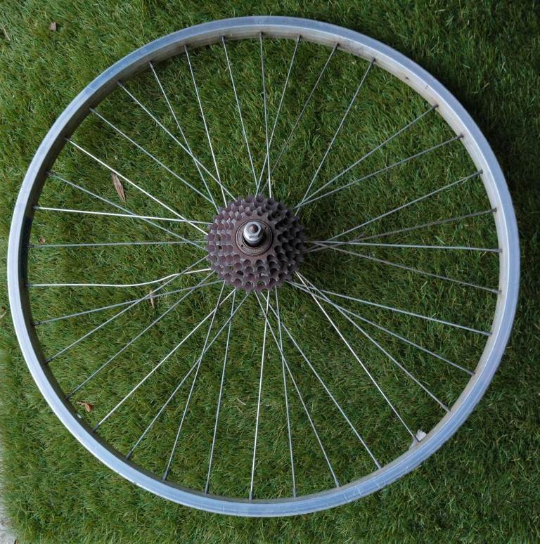 26-inch 5speed Rear Wheel, Innertube & Tyre one bespoke is missing & one is bent.