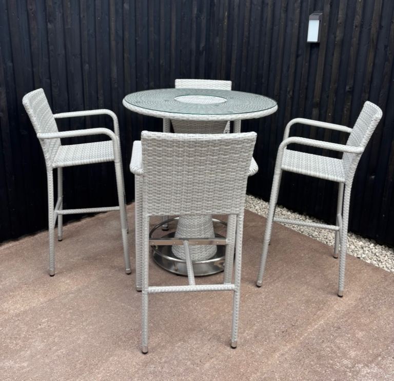 Bar height table and 4 chairs 