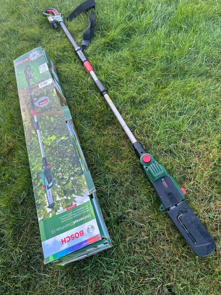 Like New long reach Bosch pole saw extendable chainsaw pruner 18 Volt range lawnmower mower trimmer