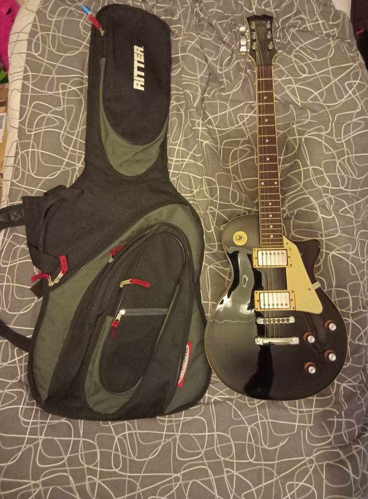 SAMICK ARTIST SERIES ELECTRIC GUITAR with guitar case.
