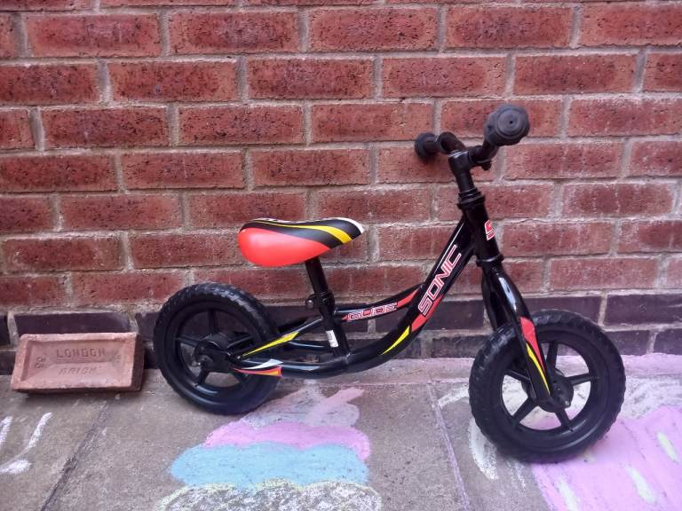 Sonic Balance Bike – Black with Red Seat, Good Condition
