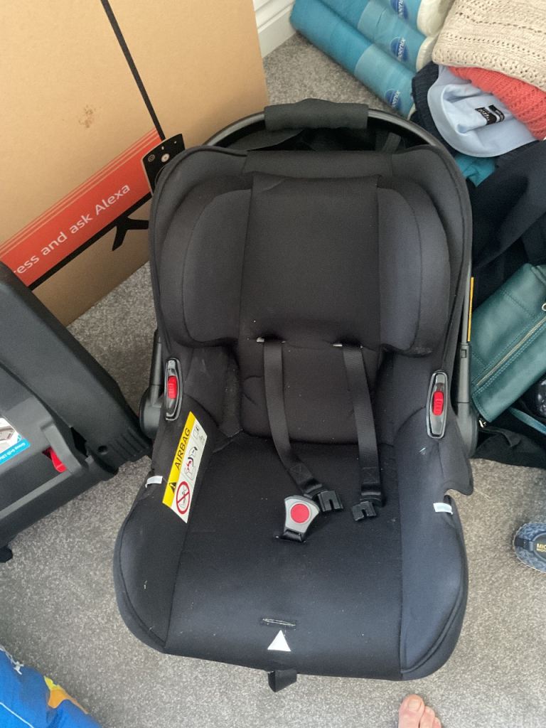 Free baby car seat and cot, also outfits and toys