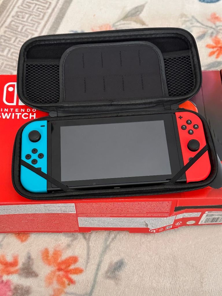 Nintendo Switch Console with Joy-Cons and Carry Case – Good Condition