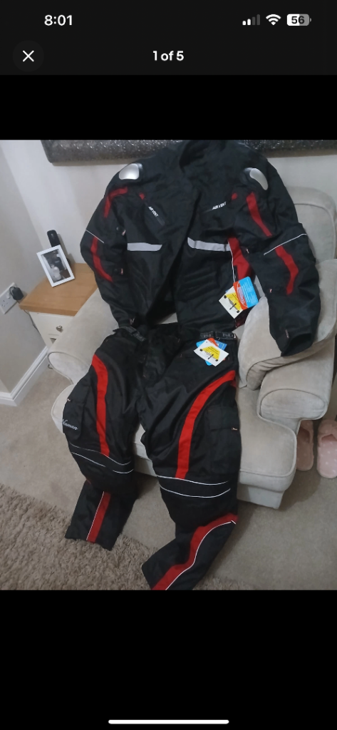 New with tags motorcycle jacket and trousers 