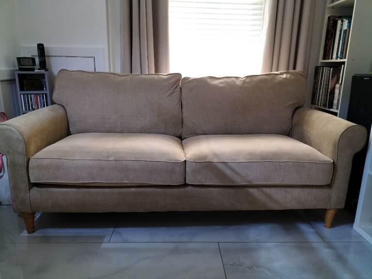 Comfy Beige Two-Seater Sofa – Good Condition