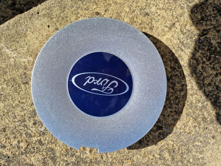 For sale one centre cap for 2009 ford fusion brand new neaver fitted off 16 inch alloy