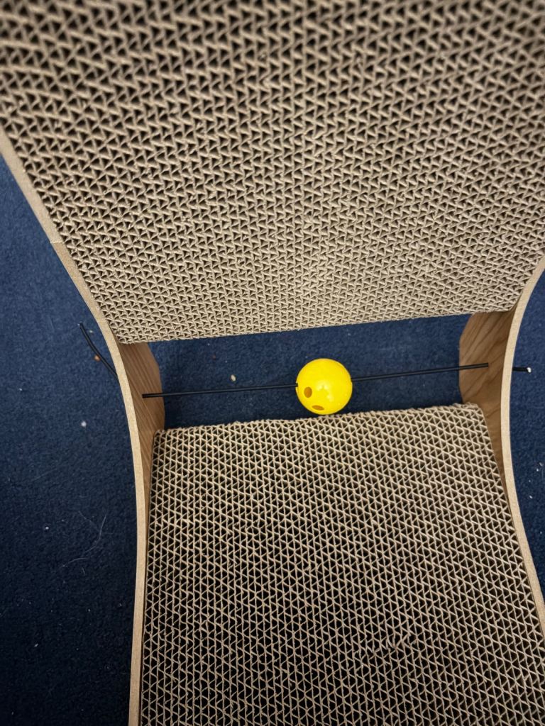 IKEA Utsadd cat house and L shaped layered cardboard cat scratching post