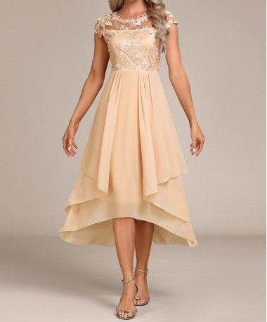 Elegant Ladies Champagne Dress. 