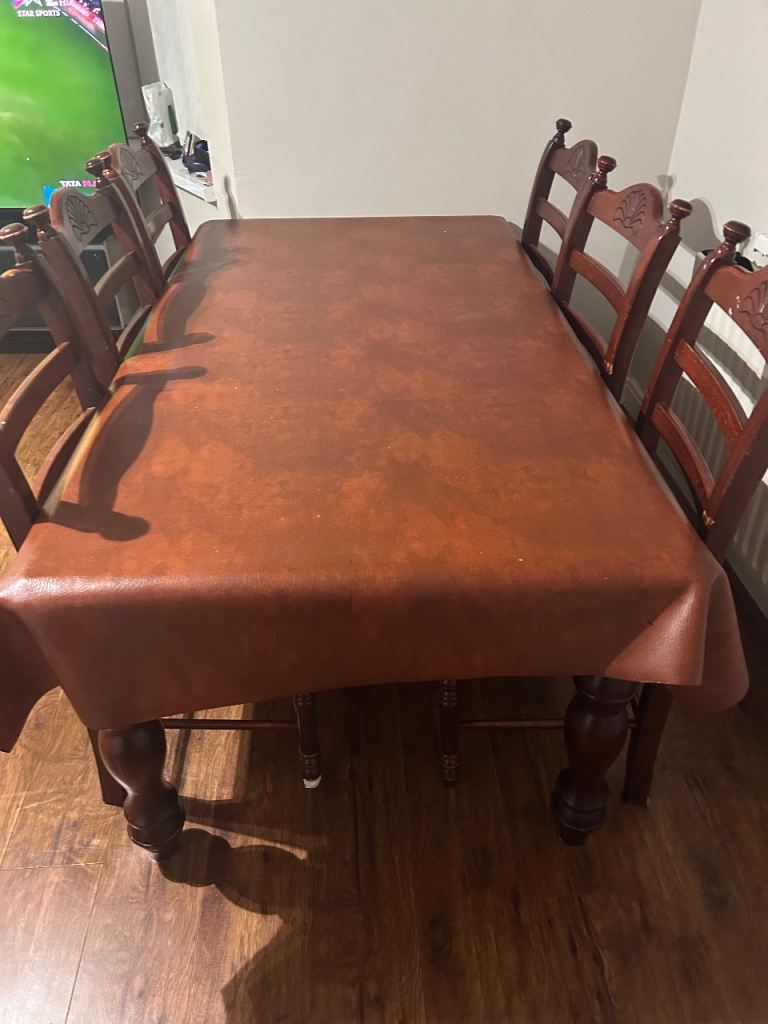 6 seater wooden/brown dining table 