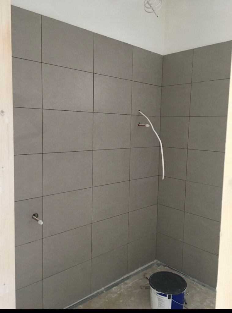 34 New wall tiles, light grey. £20. Approximately 4.7 square metres