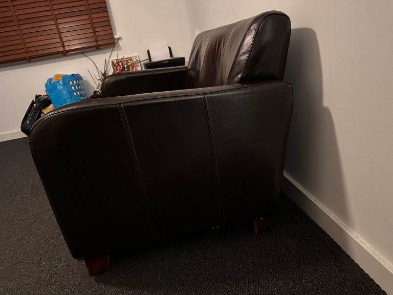 Brown 2 seater leather sofa 