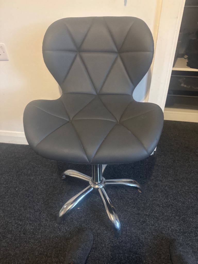 Grey swivel chair