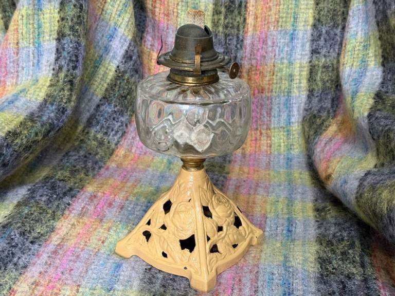 antique victorian art nouveau Falks Oil Lamp, on a pyramid cast iron Rose base