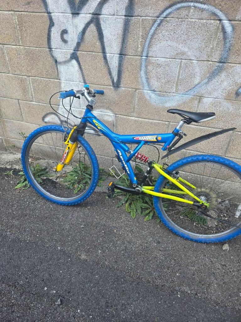 Rampage Mountain Bike – Blue & Yellow, Fair Condition