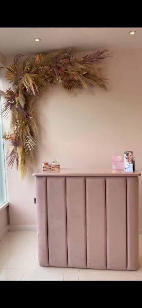 Pink velvet reception desk 