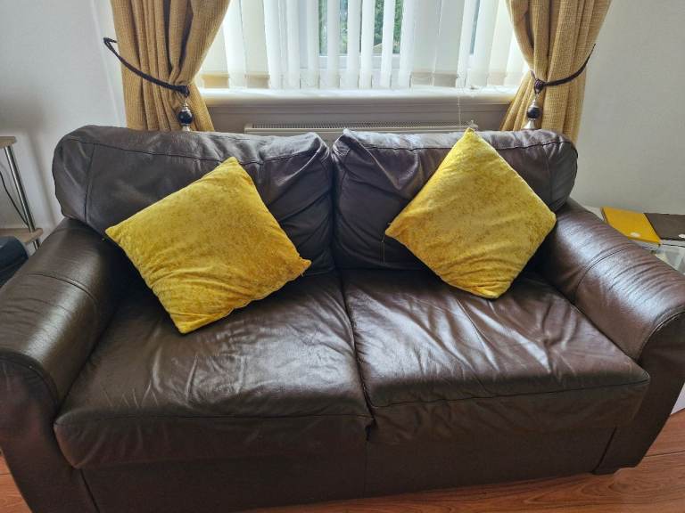 Used brin leatherette sofa on sale.