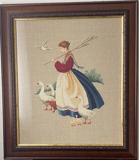 Framed needlework picture.