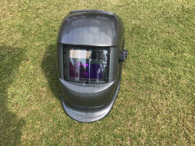 image for Welding helmet, gloves, wire and gas