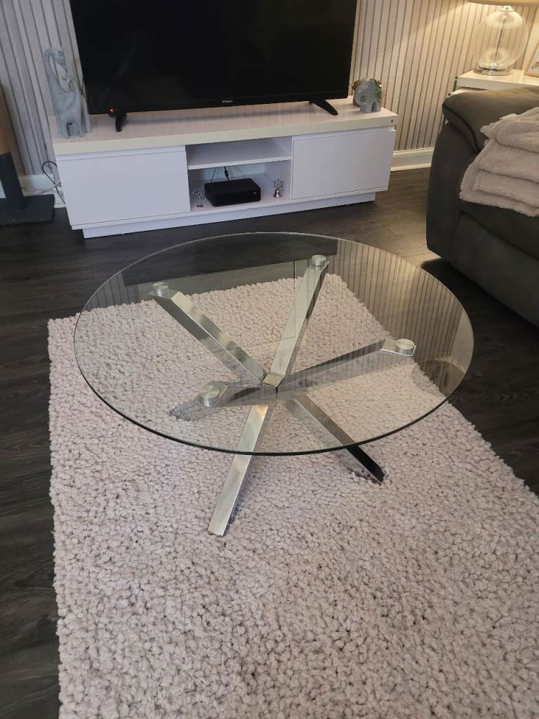 Round glass and chrome coffee table