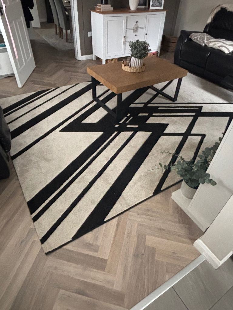 Modern Black and Cream Geometric Pattern Rug – Good Condition