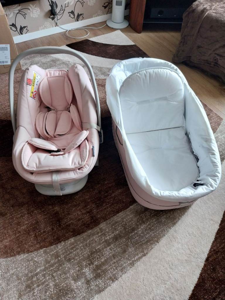 Pink Bebecar car seat and carry cot