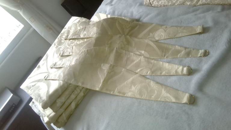 2-pairs of pencil pleat curtains.... gold colured.