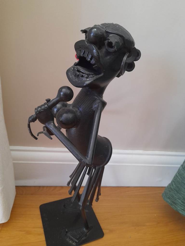 Interesting and unusual 'singer' made of metal spare parts. Collectors