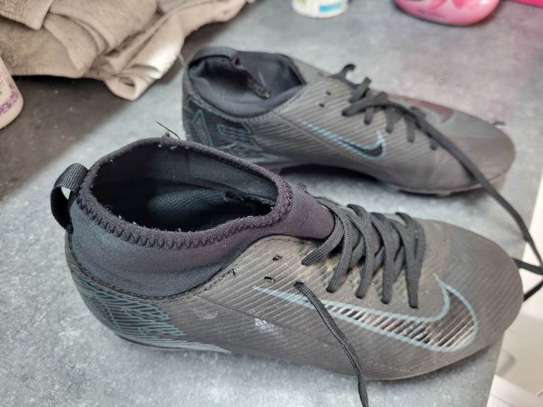 Black Nike football boots for kids 